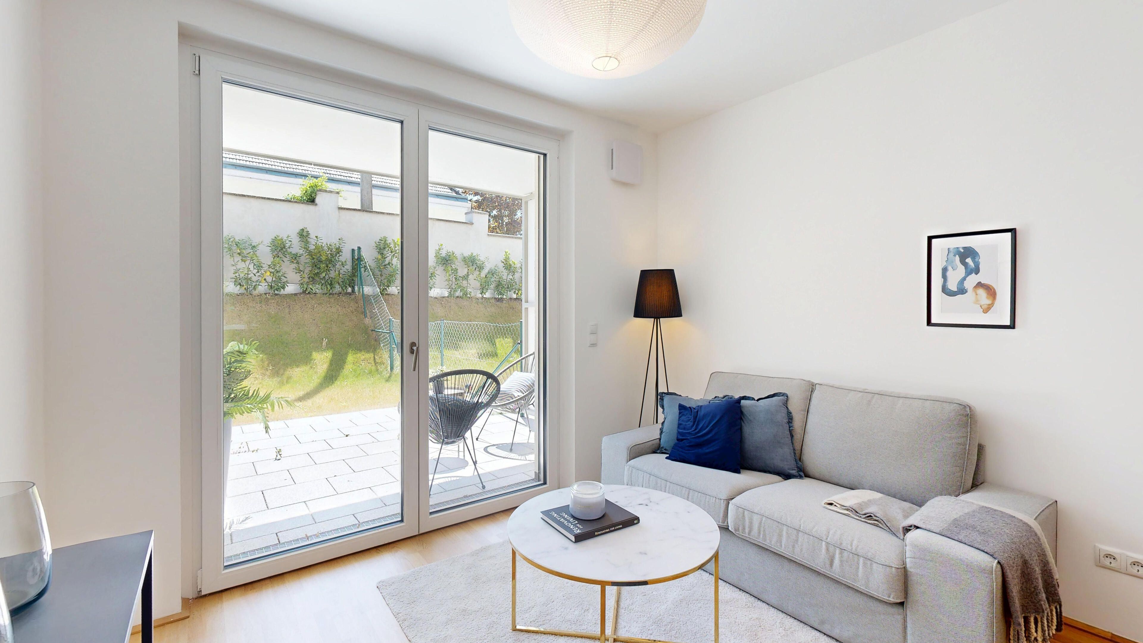 Ansicht Wohnzimmer mit Zugang Garten