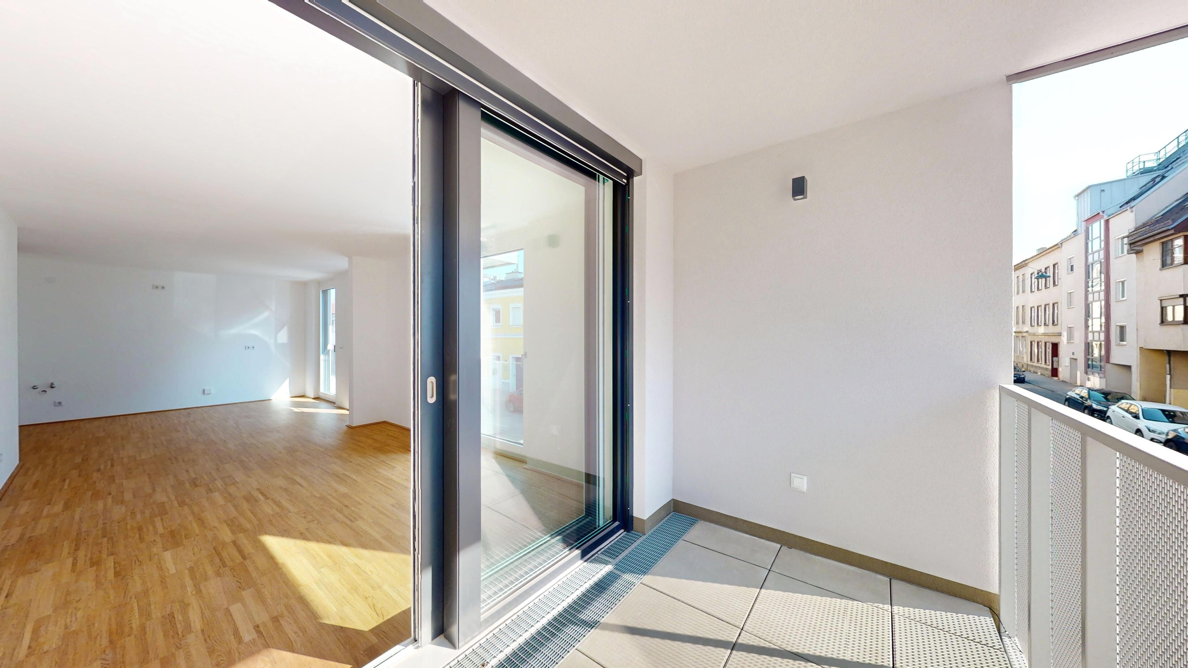 Darstellung der Terrasse mit Blick in den Wohnraum