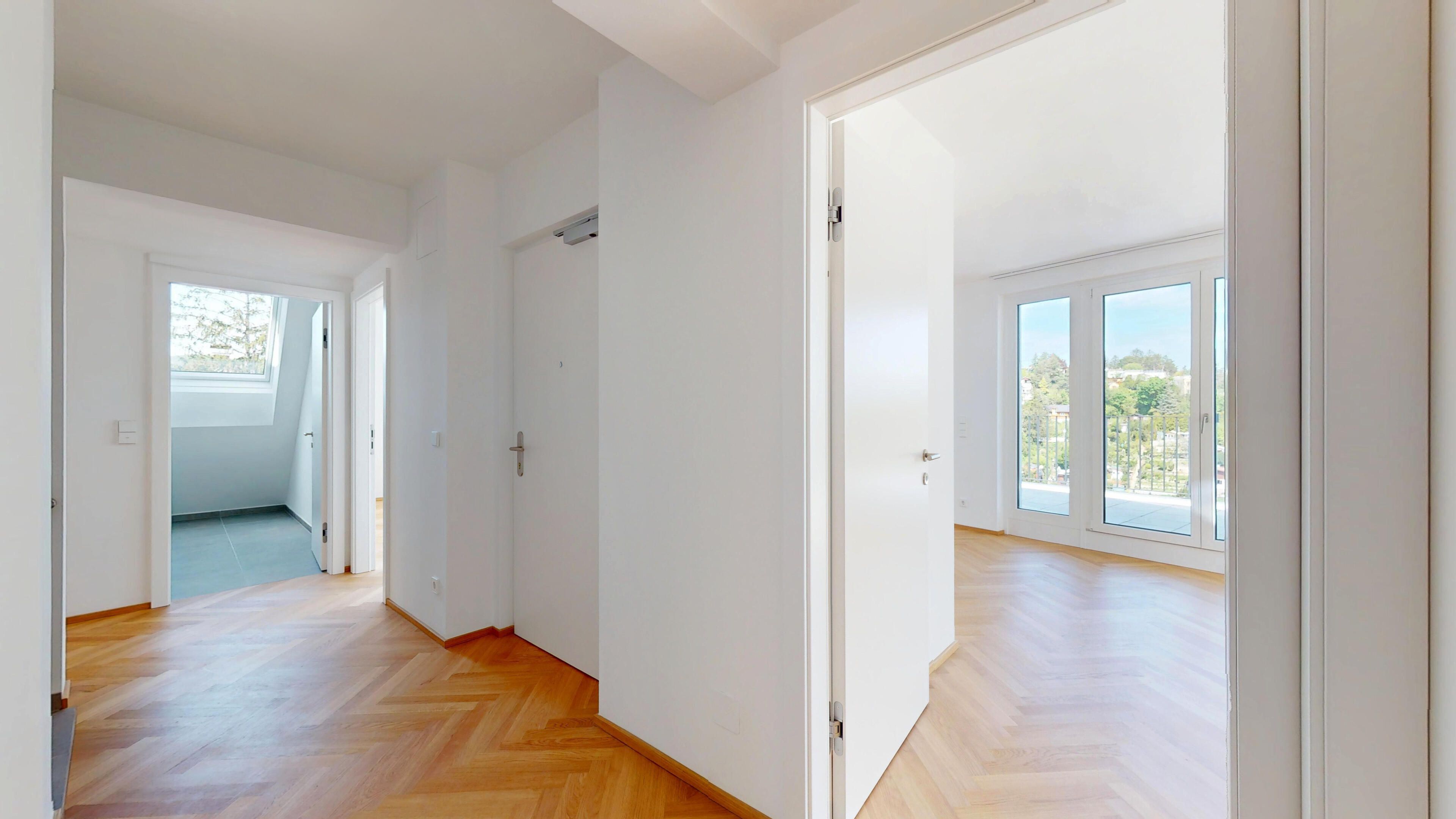 Ansicht eines Flurs mit Blick in einige Zimmer