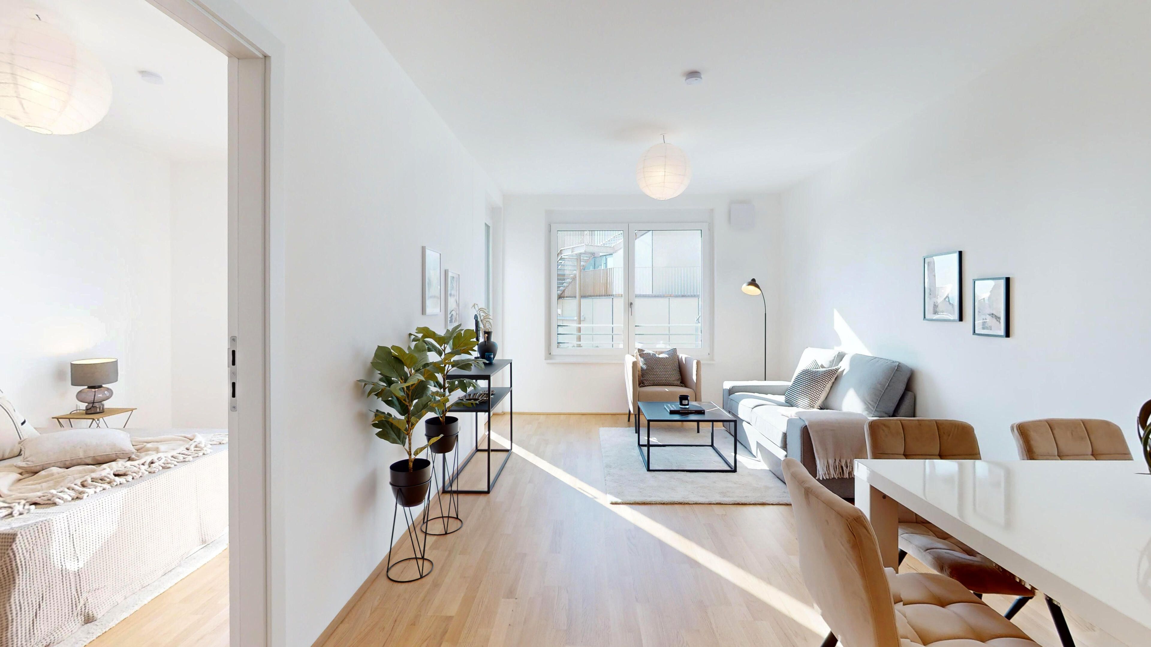 Ansicht Wohnraum mit Blick ins angrenzende Schlafzimmer